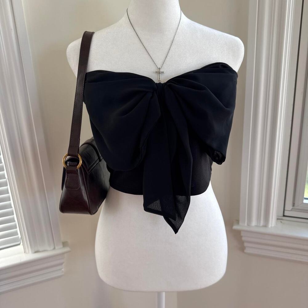 Solemio black tube crop top with bow detail